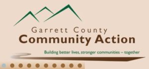 A brown and white logo for the garrett county community action.